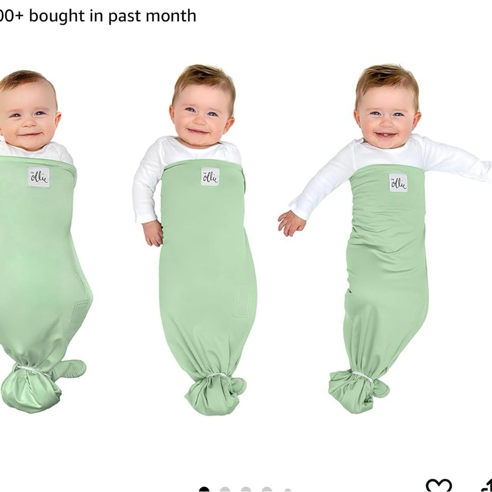 Two Ollie swaddles - only used a few times -Meadow and Sky colors